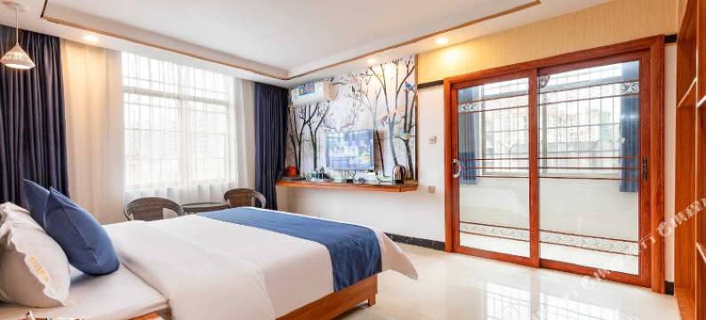 新兴优居乐主题酒店图片