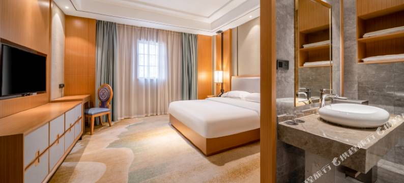 君美达酒店(安顺市人民医院驼宝山广场店)图片