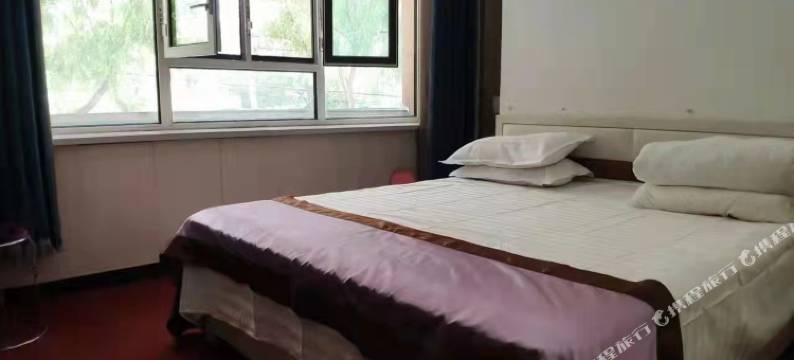 牡丹江鑫时钟快捷旅馆(黑龙江商业职业学院东校区店)图片