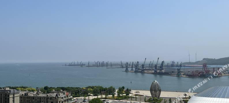 星湾石贝海景公寓(开发区拾贝湾梦幻水乐园店)图片