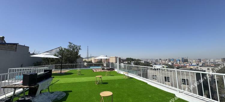 木姐家民宿(水磨沟区北山坡店)图片