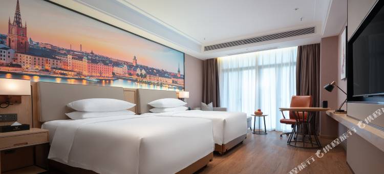 维也纳国际酒店(定安日广凤羽林店)图片