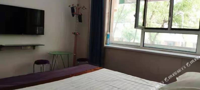 牡丹江鑫时钟快捷旅馆(黑龙江商业职业学院东校区店)图片