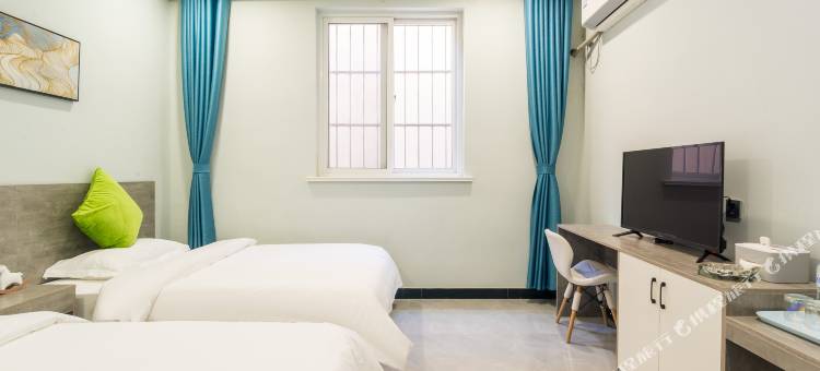 轻住悦享酒店(青岛农业大学地铁站店)图片