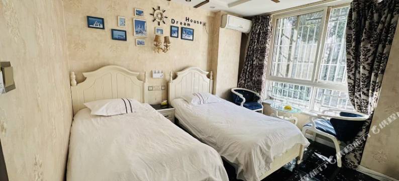 西昌柒贤客栈(湿地公园店)图片