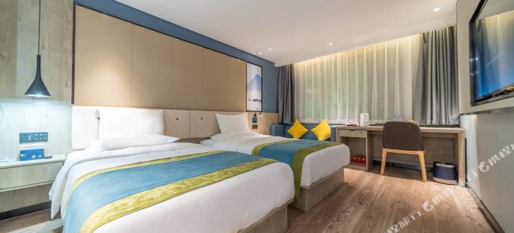 丽橙酒店·智(宜昌三峡大学CBD购物中心智能店)图片