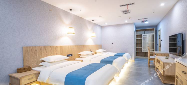 桃花源酒店(米东吾悦广场贡米巷店)图片