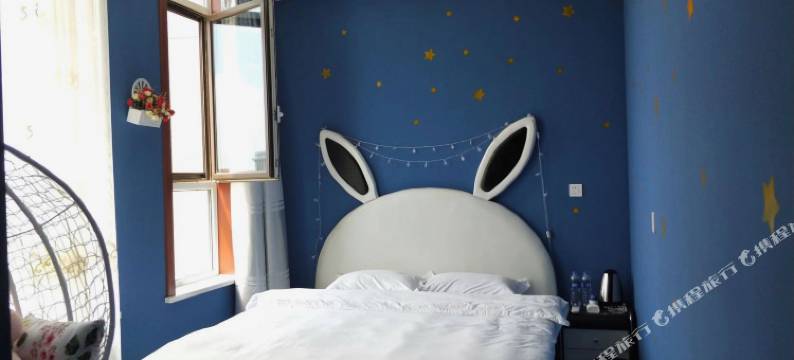 瓦房店雨露主题宾馆图片