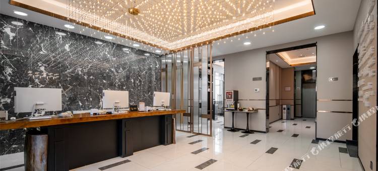 白玉兰酒店(泰安新泰青云购物中心金斗路店)图片