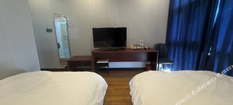 四月天宾馆(镇江火车站万达广场店)图片