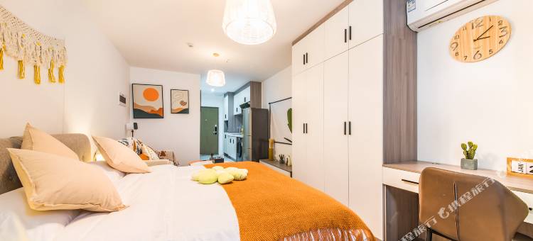 栖牛XINIU·投影自助公寓(乐山万达广场店)图片