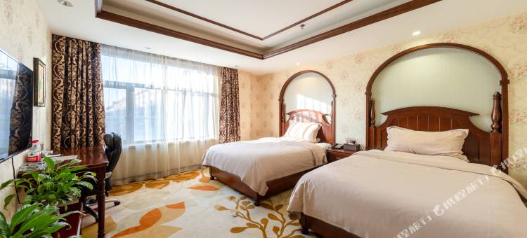 德惠怡美小镇假日酒店(住邦城市广场店)图片