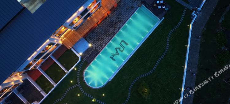 悠然江畔设计师艺术酒店图片