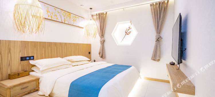 桃花源酒店(米东吾悦广场贡米巷店)图片