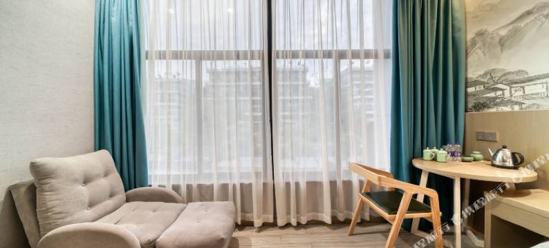 回禾梦巢酒店(龙游城北开发区店)图片