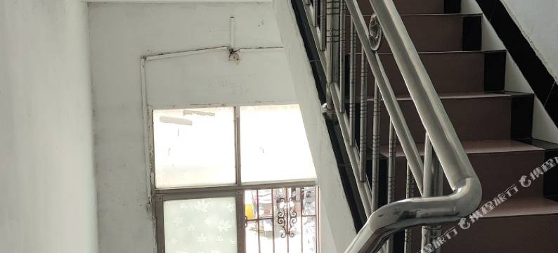 新港旅店(武汉纺织大学阳光校区江夏一中店)图片