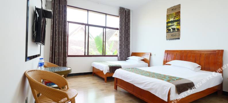 西双版纳曼降纳亮风情傣楼民宿图片