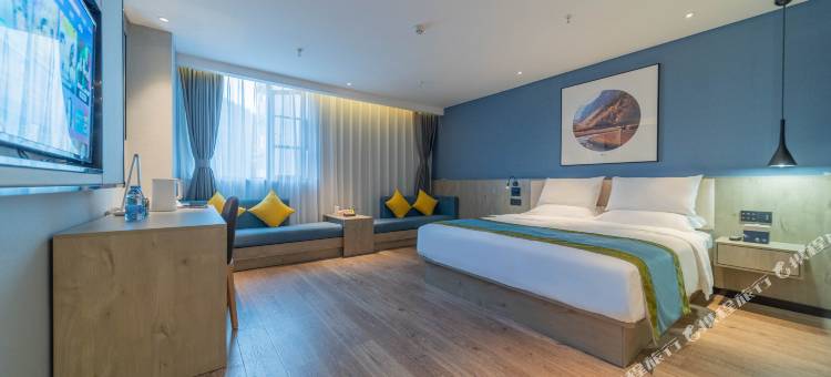 丽橙酒店·智(宜昌三峡大学CBD购物中心智能店)图片