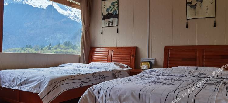 德钦雨崩聚缘小屋观景客栈图片