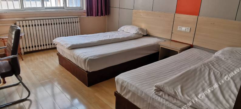 贵安商务宾馆(嘉祥一中萌山校区唐宁街店)图片