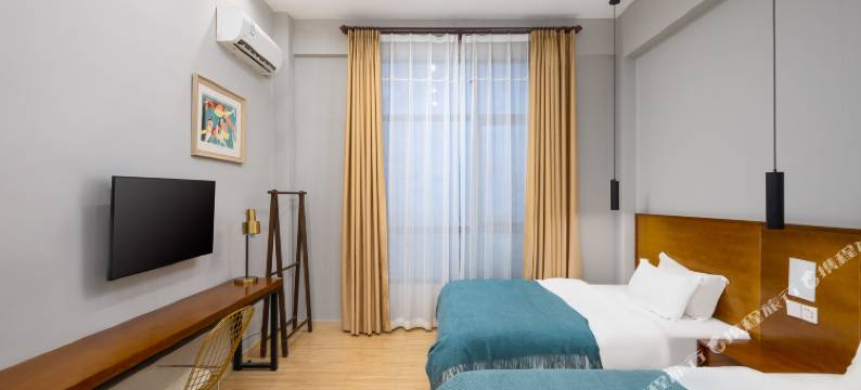 喜上花田设计酒店(海口美兰机场店)图片