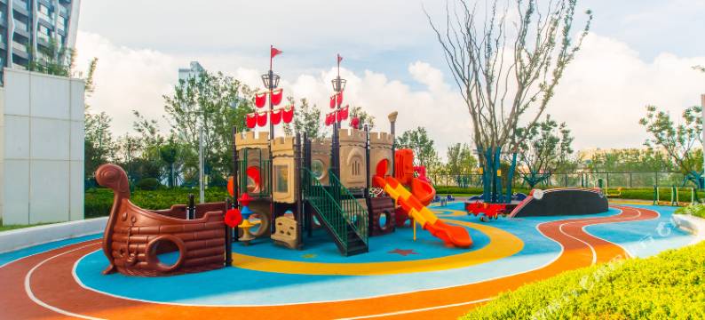 暖阳精品公寓(青岛城市阳台欢乐海湾店)图片