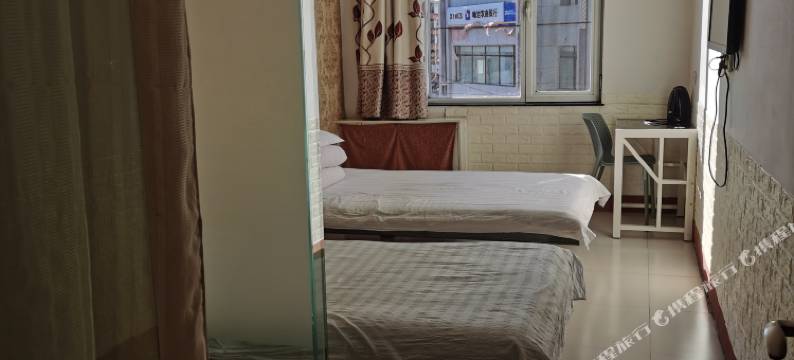 岫岩朋来快捷客房图片