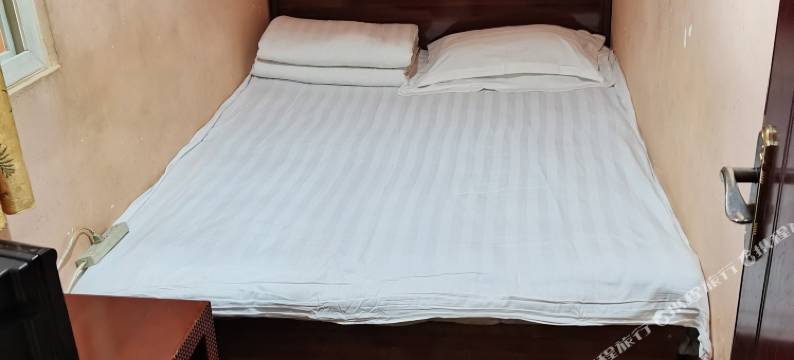 鄂尔多斯鑫缘小宾馆(万达广场中心医院店)图片