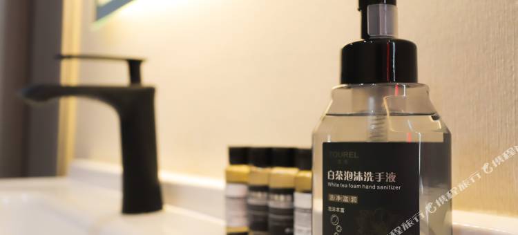 长春芒果宾馆(上海路万达广场活力城店)图片