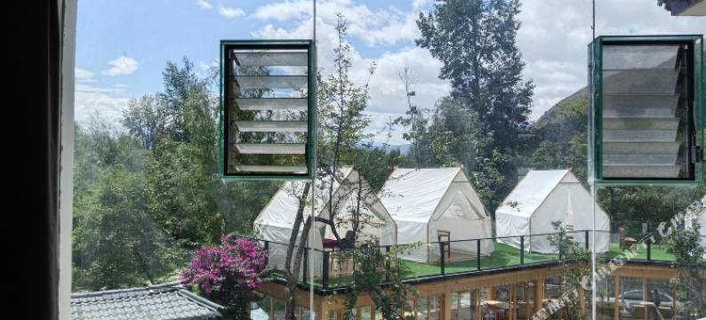 洱源世外梨园早安日月居湖景客栈图片