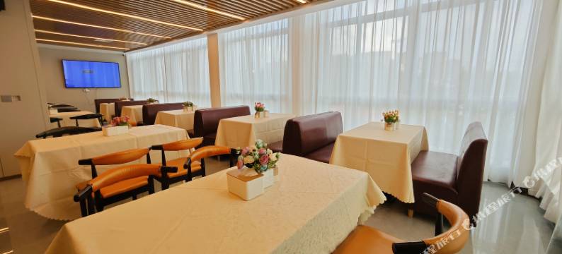 花漾舒适酒店(九曲湾温泉首创奥特莱斯店)图片