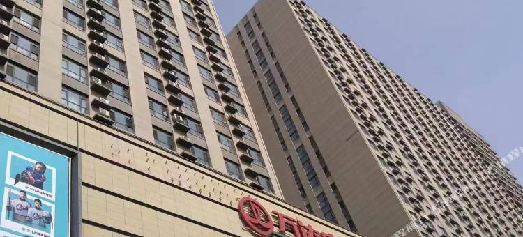 沐风主题民宿(万达公寓店)图片
