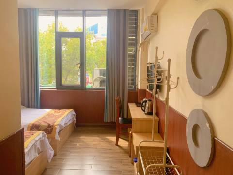 颍上速七假日宾馆(吾悦广场店)