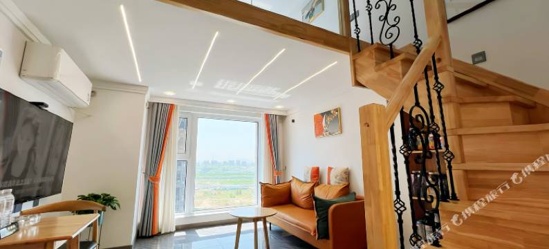 百岁鱼海景loft民宿(养马岛度假区店)图片