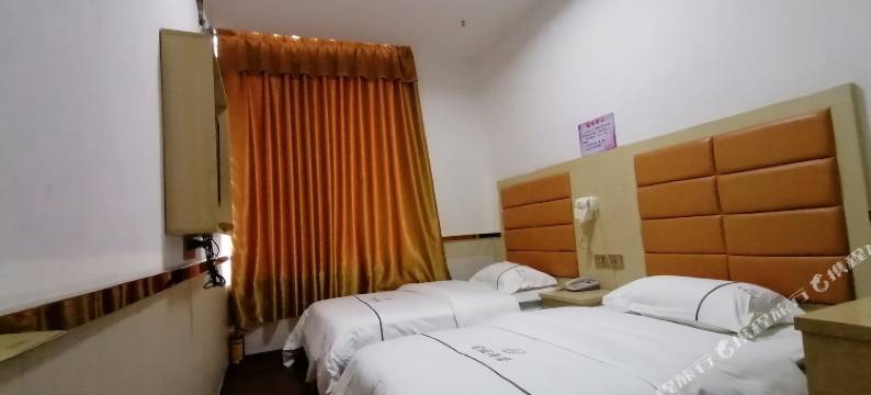 广州富成酒店(罗冲围客运站摩配城店)图片