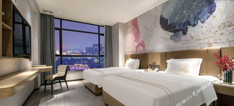 依曼酒店(佛山西站沙堤机场店)图片