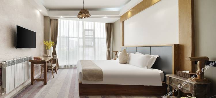 橘子树酒店(眉山音乐喷泉盖丽店)图片