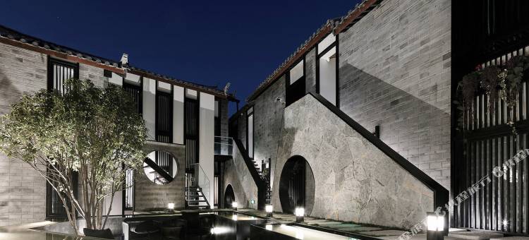 丽镘丨花林溪畔徽派诧寂风度假庭院(丽江古城南门木府店)图片