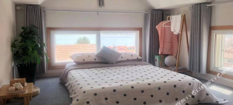 青岛尔畔withU民宿(会场赶海园店)图片