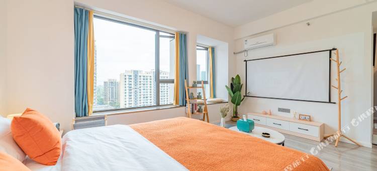 栖牛投影自助公寓(乐山世豪广场店)图片