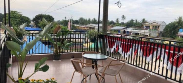 纳修奇瓜拉丹绒旅馆(Guest House Nasyauqi Kuala Tanjung)图片