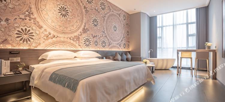 曼陀伦Plus智能酒店(江门和兴广场五邑华侨广场店)图片