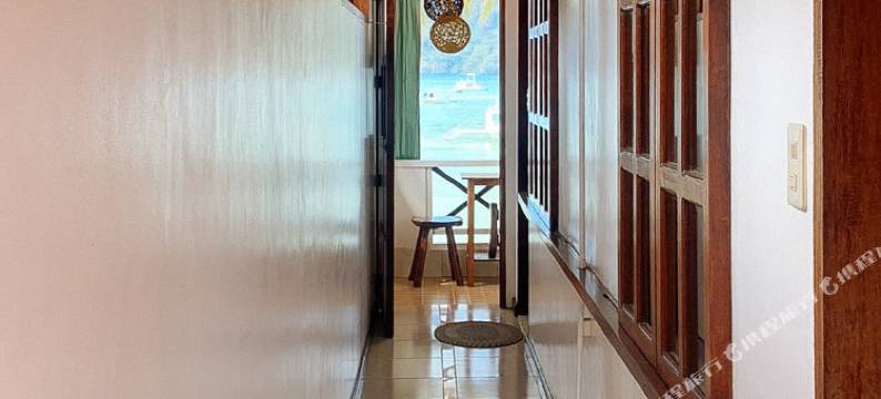 坦迪坎海滩小屋(RedDoorz @ Tandikan Beach Cottages)图片