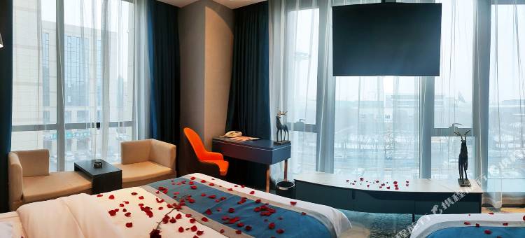 九方财富酒店(乌鲁木齐机场店)图片