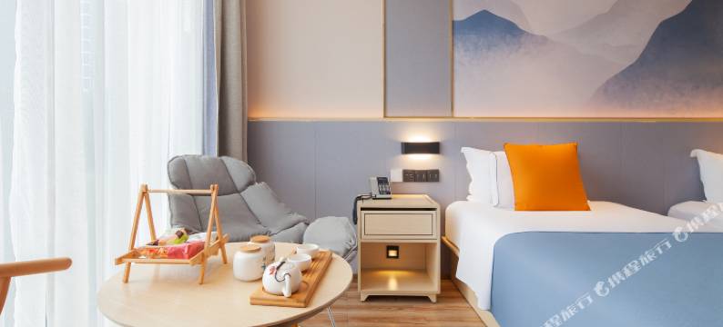 沁颐酒店(绍兴柯桥银泰百货中国轻纺城地铁站店)图片