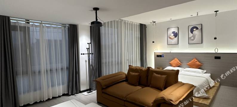 普者黑源上轻宿COURTYARD ABOVE CLOUDS影音美宿(普者黑风景区店)图片