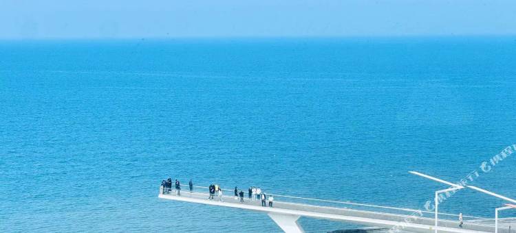 一宿朝阳民宿(烟台金沙滩海水浴场店)图片
