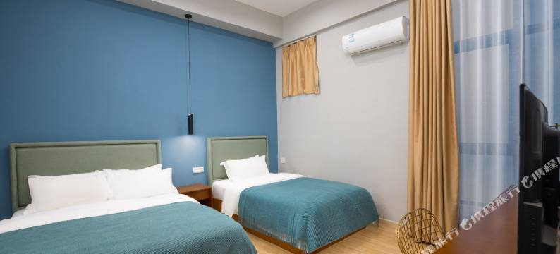 喜上花田设计酒店(海口美兰机场店)图片