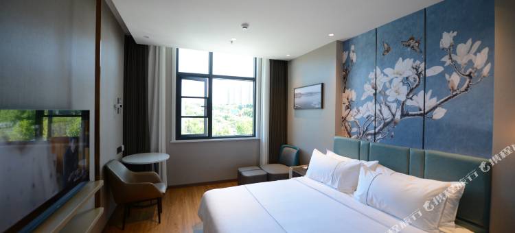 白玉兰酒店(十堰东风大道机场店)图片