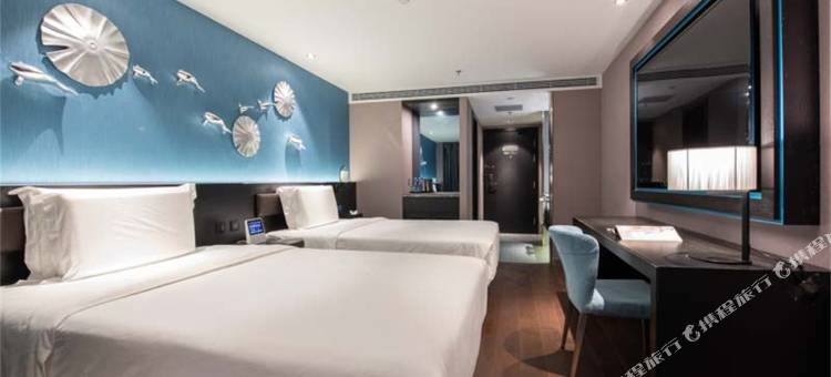 青岛崂山区石老人海水浴场桔子水晶酒店图片